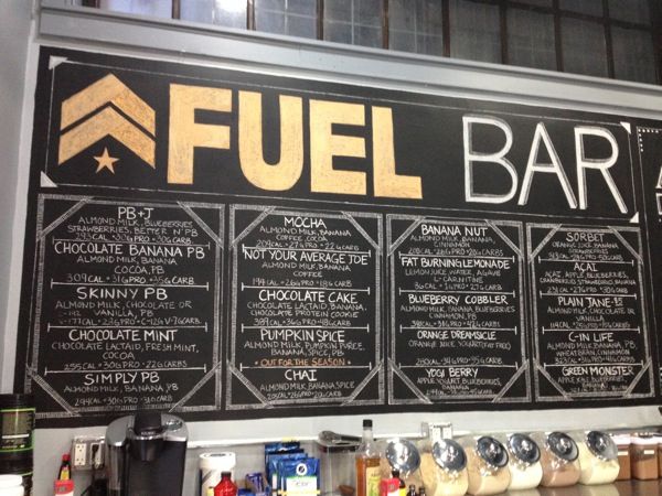 Industrial Chic Cafe Design: Bold Chalkboard Menu and Inviting Atmosphere