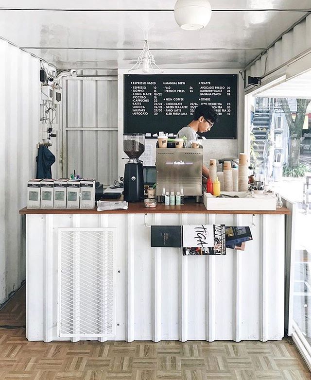 Minimalist Shipping Container Cafe Design with Inviting Atmosphere and Efficient Layout