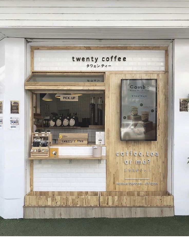 Cozy and Stylish Cafe Design: A Warm Wood Facade, Abundant Natural Light, and a Minimalist Aesthetic