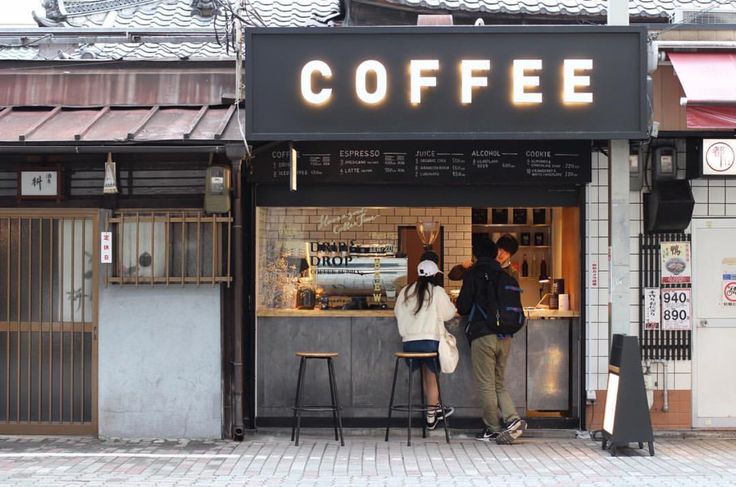 Charming Modern Cafe with Welcoming Facade and Cozy Interior for Coffee Lovers