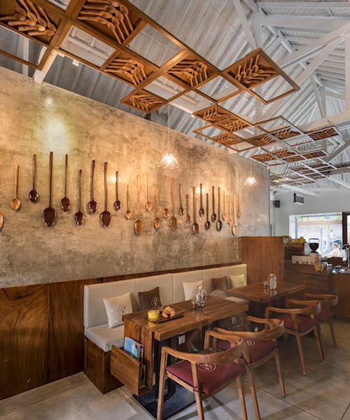 Charming Cafe Blends Rustic and Contemporary Design with Unique Wooden Accents