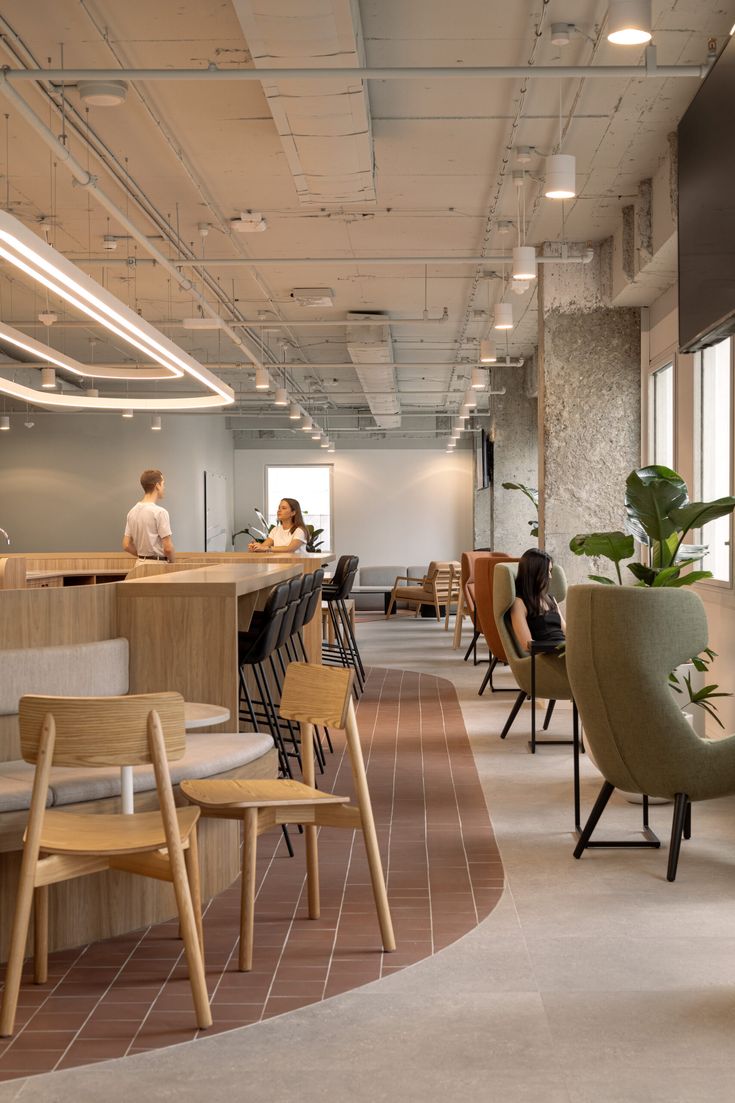 Modern Cafe Design Emphasizing Spaciousness, Natural Materials, and Inviting Atmosphere