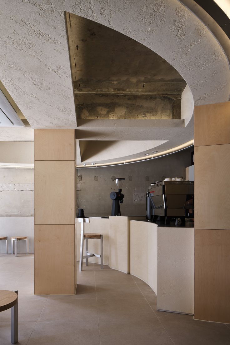 Modern Minimalist Cafe Design: A Welcoming Blend of Natural Materials and Thoughtful Layout