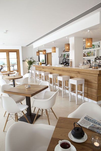 Bright and Welcoming Cafe Design: Modern Minimalism Meets Cozy Comfort