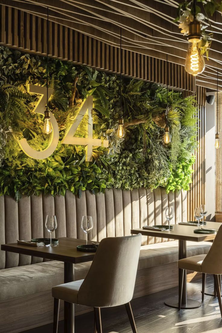 Sophisticated Cafe Design Merges Nature and Modern Elegance for Intimate Dining Experiences