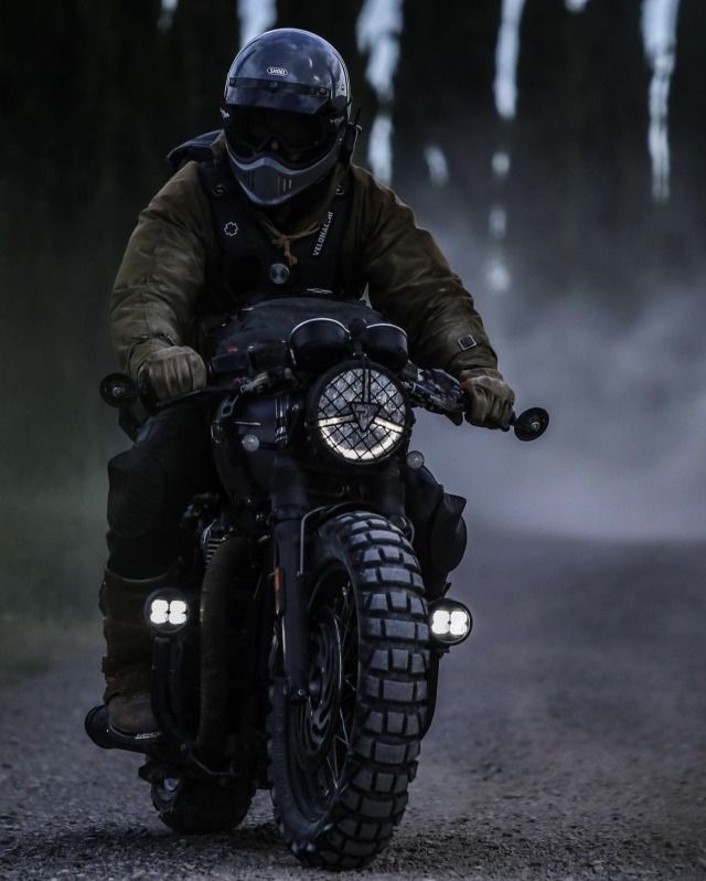 Embracing Adventure: A Motorcyclist in a Rugged Off-Road Setting