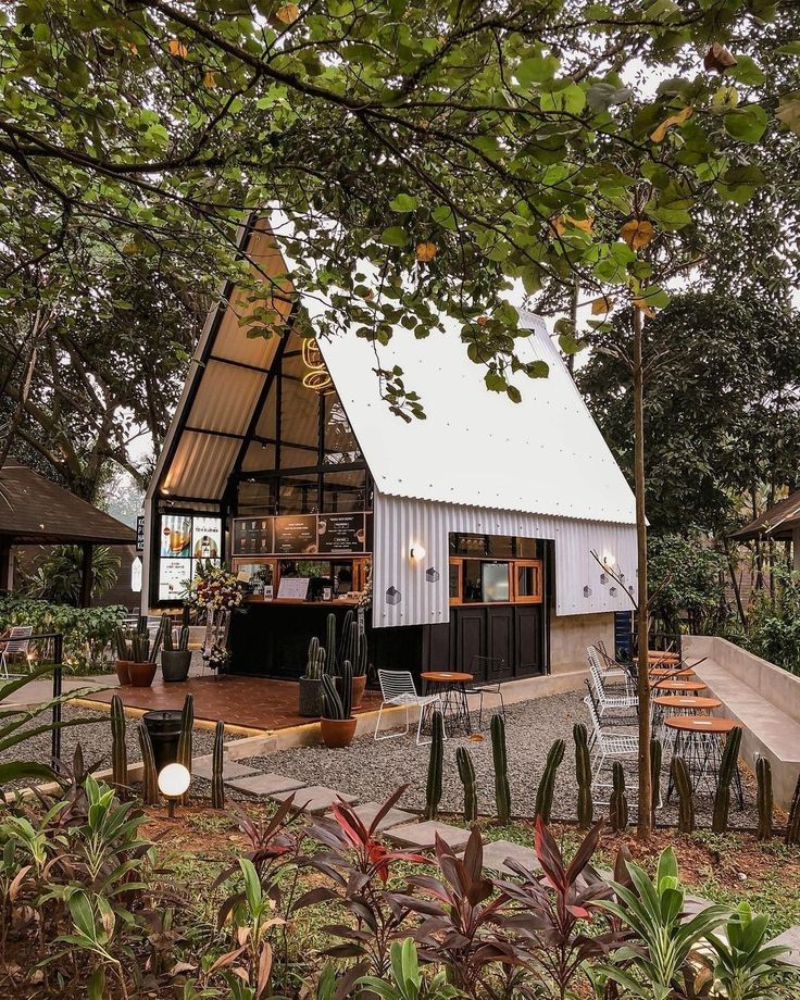 Chic A-Frame Cafe: A Modern Oasis Merging Nature with Contemporary Design