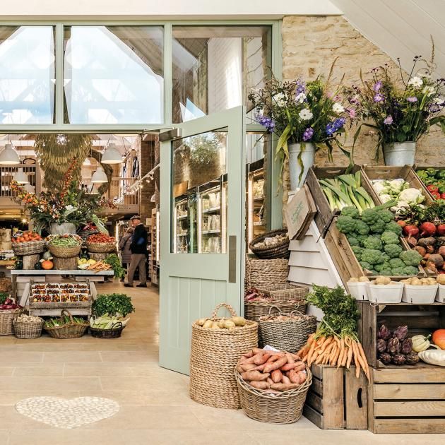 Charming Rustic Cafe Design: An Inviting Blend of Natural Materials and Lush Greenery