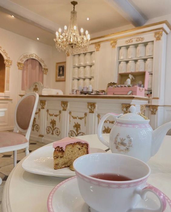 Charming Elegance: A Pastel Cafe Design with Opulent Details and Whimsical Appeal