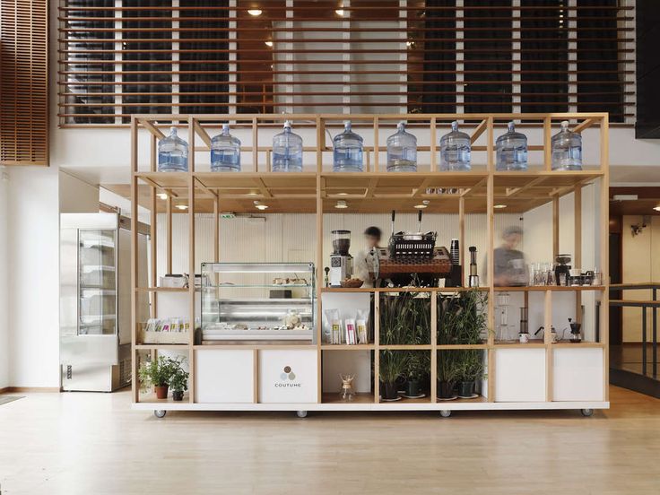 Minimalist Cafe Design: An Inviting Fusion of Functionality and Style with Natural Light