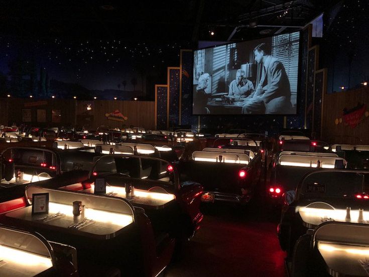 Retro Drive-In Cafe: A Nostalgic Dining Experience with Classic Car Booths and Cinematic Ambiance