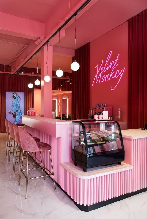 Chic Cafe Design: A Playful Pink Ambiance for Social Gatherings