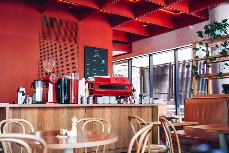 Modern Urban Cafe Design with Bold Accents and Inviting Atmosphere