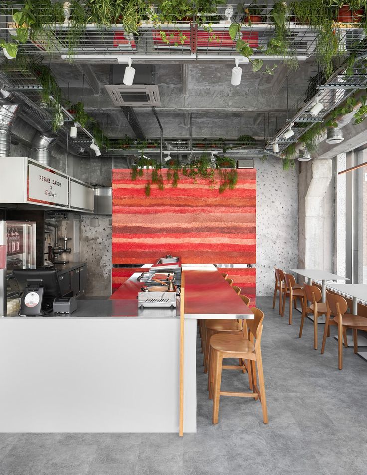 Modern Minimalist Cafe Design: A Harmonious Blend of Industrial Sleekness and Natural Warmth