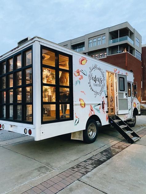 Charming Floral Food Truck: A Rustic-Modern Mobile Cafe Inviting Urban Passersby