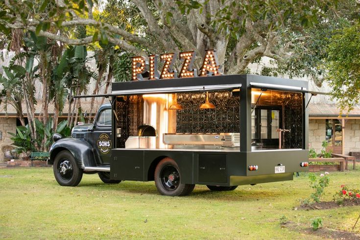 Vintage Truck Transformed into Stylish Pizza Cafe for Unique Mobile Dining Experience