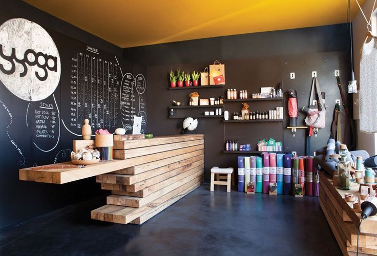 Inviting Modern Cafe Design Blends Rustic Elements with Vibrant Accents for a Calming Atmosphere