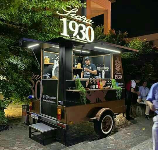 Charming Mobile Coffee Cart Combines Style and Practicality for a Welcoming Nighttime Atmosphere