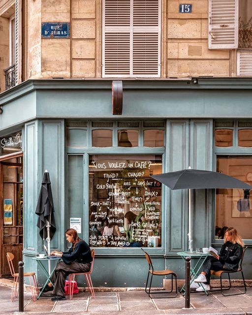 Charming Parisian Cafe with Inviting Ambiance and Whimsical Menu