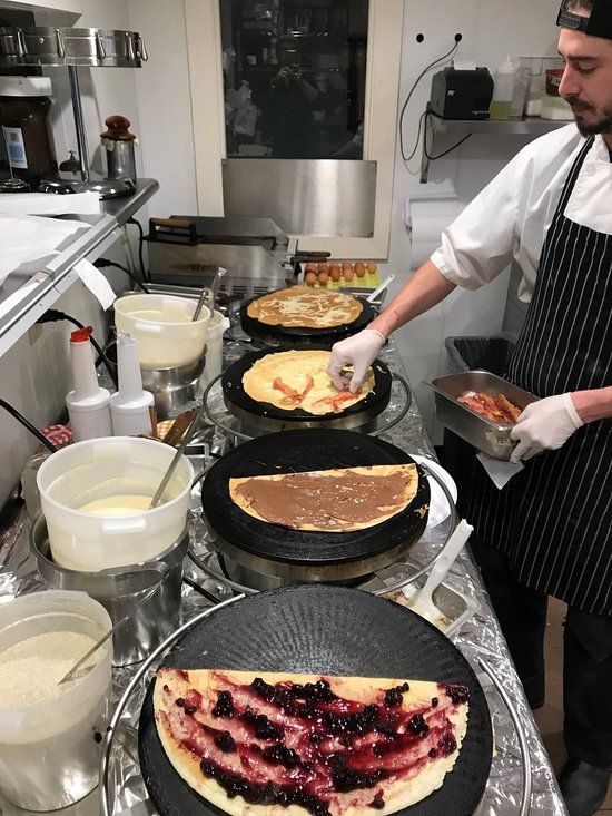 Vibrant Cafe Kitchen Showcasing Crepe-Making Artistry