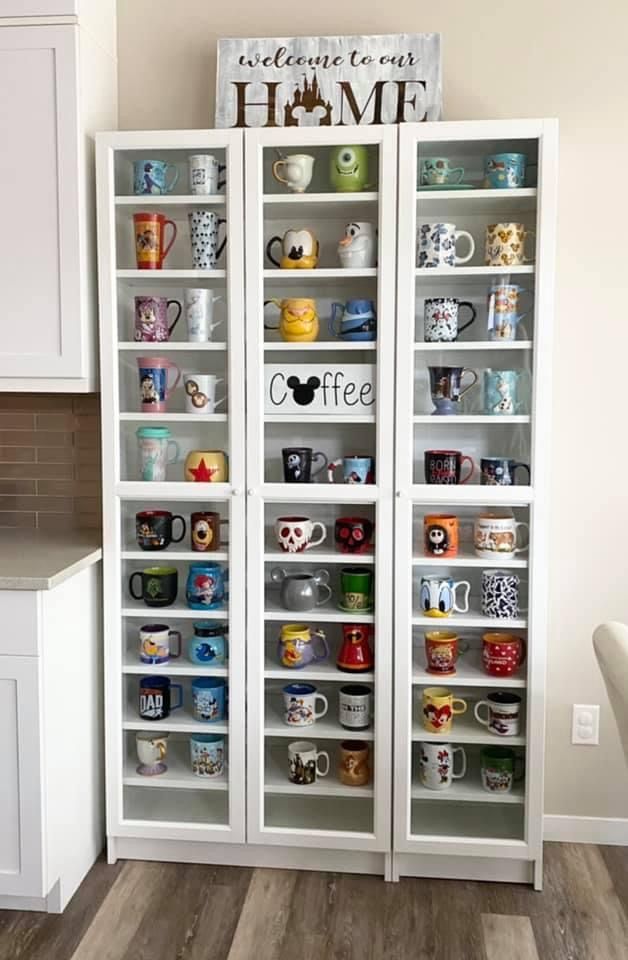 Charming Cafe Display: An Eclectic Showcase of Colorful Coffee Mugs