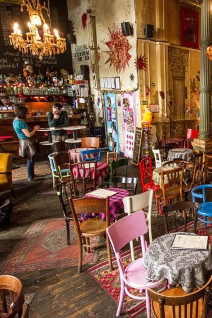 Vibrant Eclectic Cafe Design: A Cozy Blend of Vintage Aesthetics and Artistic Charm