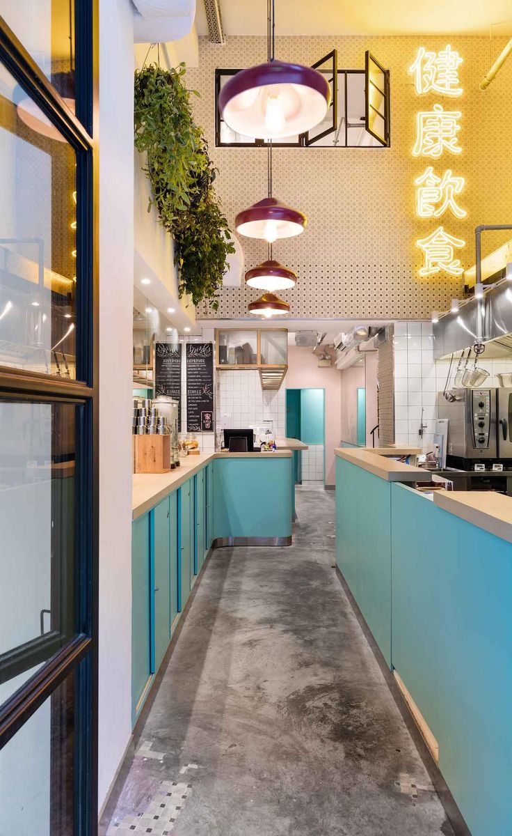 Modern Cafe Design: A Harmonious Blend of Pastel Colors, Industrial Elements, and Natural Touches