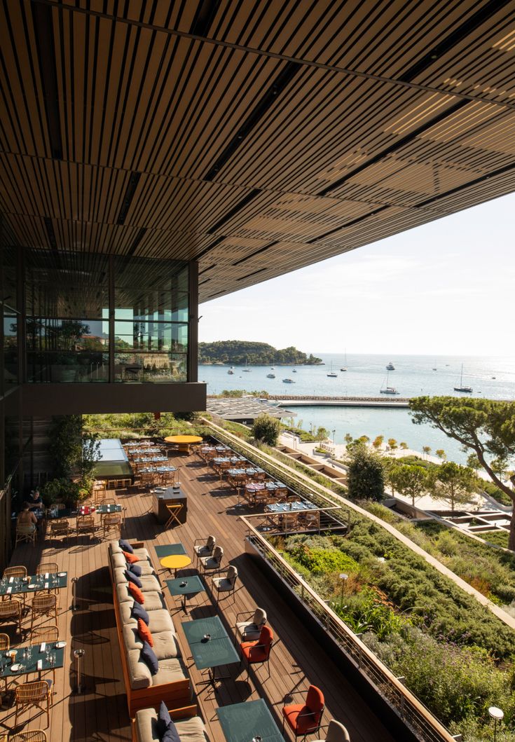 Contemporary Open-Air Cafe Design Harmoniously Blends Nature with Ocean Views