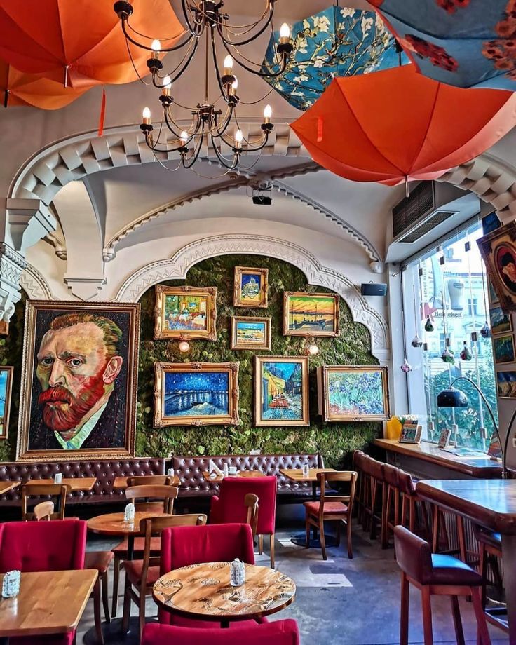 Vibrant Cafe Design Blends Artistic Ambiance with Lush Greenery and Eclectic Decor