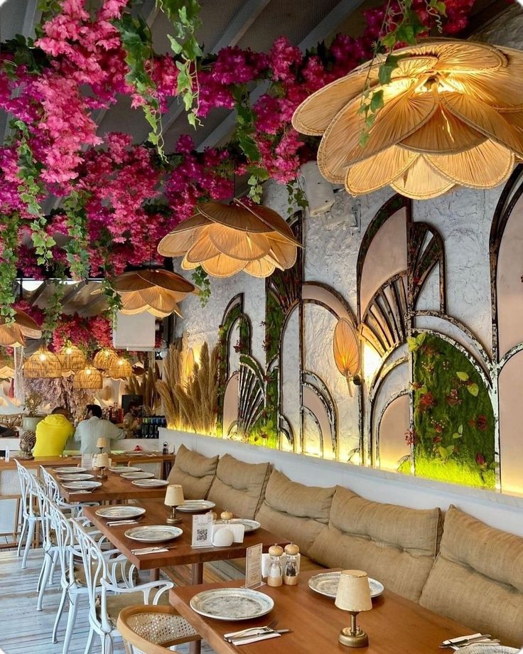 Vibrant Cafe Design: Cascading Floral Ceilings and Elegant Seating Create an Inviting Atmosphere