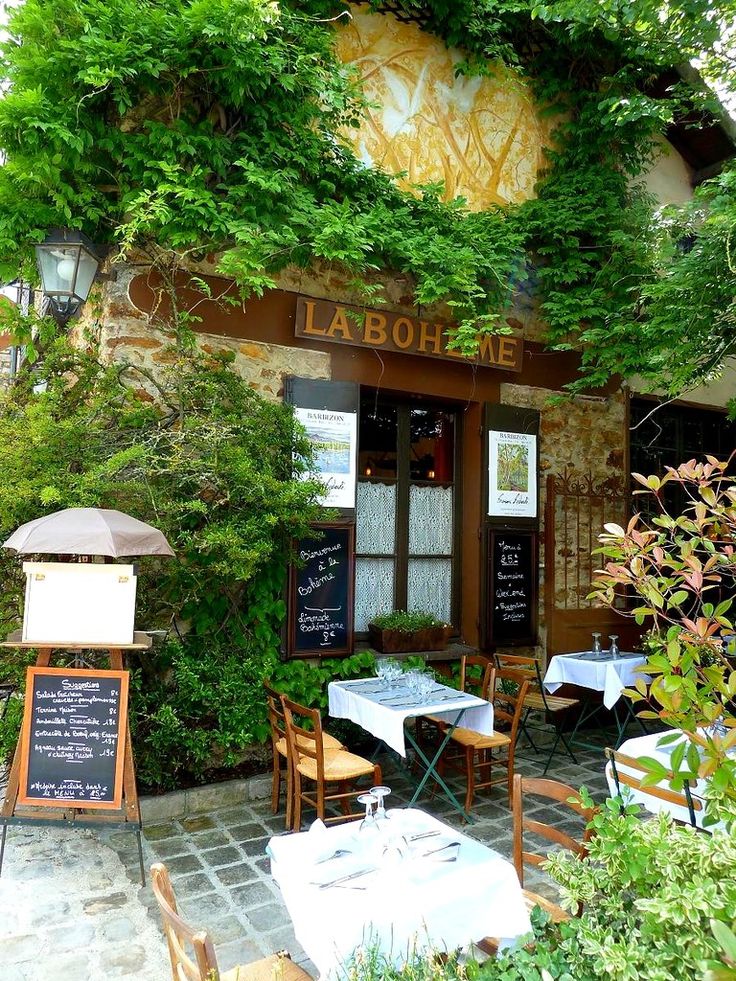 Charming Cafe with Rustic Facade and Cozy Nature-Inspired Atmosphere